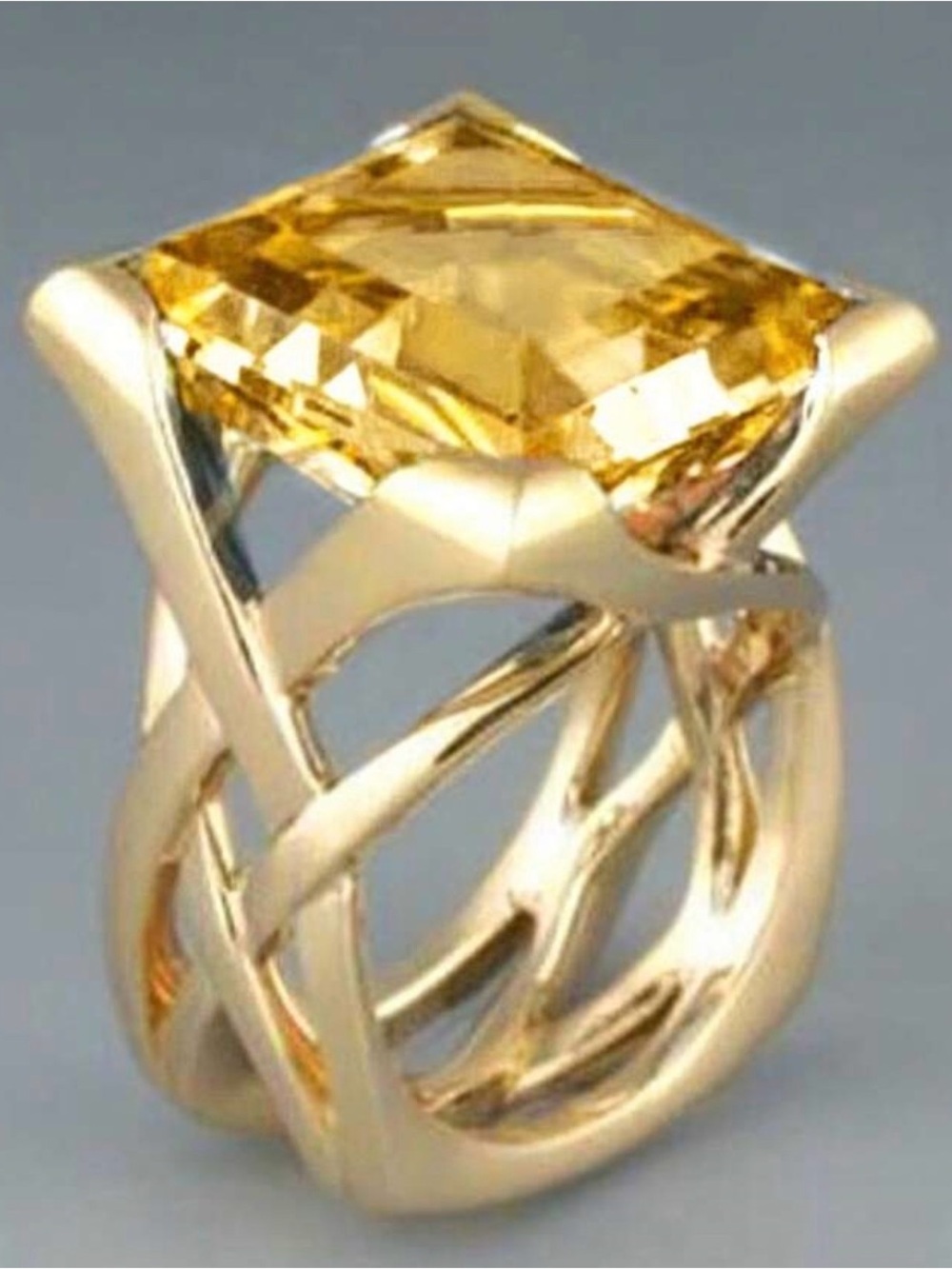 Gold-Tone Interwoven Ring with Golden Yellow Square Gemstone